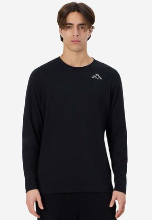 T-shirt nero a maniche lunghe realizzato in cotone. Presenta un collo rotondo e un piccolo logo bianco sul lato sinistro del petto. Design semplice e monocolore.