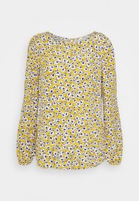 Blouse jaune à manches longues avec un col froncé et des poignets élastiques, présentant un motif floral dense blanc et bleu.