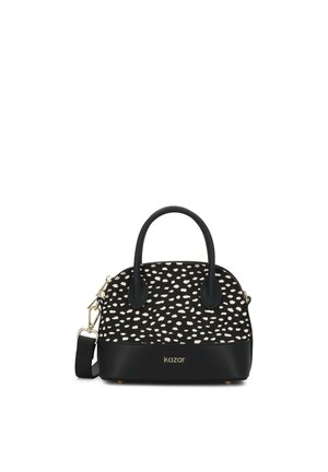 Sac à main moyen noir et blanc à taches, avec double poignée, bandoulière amovible, ferrures dorées et logo "kazar" sur le bord inférieur avant.
