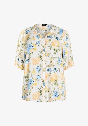 Weisse Bluse mit kurzen Ärmeln mit gelbem, blauem und grünem Blumenmuster, V-Ausschnitt und lockerem Schnitt.