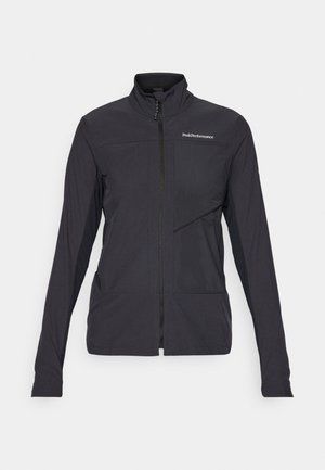 Black zip-up jacket featuring long sleeves, a high collar, textured fabric, and a diagonal front pocket. Logo positioned on the chest.
