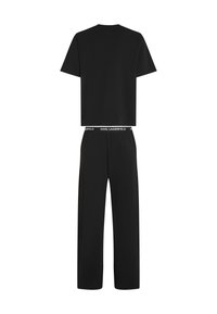 Mustalane puuvillane kodu käimine komplekt, millel on lühikeste varrukatega topp ja laiad püksid. Vöökoht kannab valget teksti "KARL LAGERFELD".