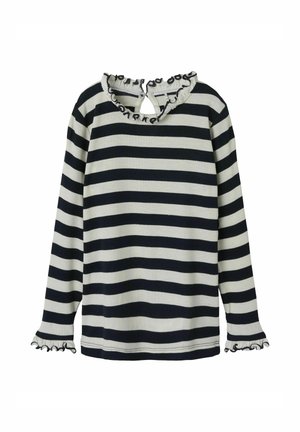 Langzaam mouwen gestreepte top in marineblauw en crème, met een ruches halslijn en manchetten, voorzien van een sleutelgat achteraan met knoopsluiting.