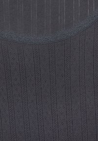 Dark gray fabric featuring vertical stripes and small decorative holes, with a delicate lace trim along the top edge.