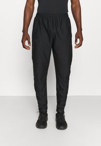Under Armour Pantalones deportivos - black