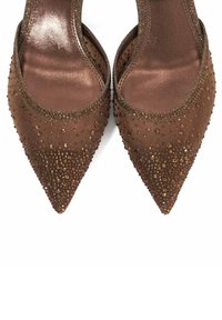 Brown pointed toe heels with textured fabric, adorned with dark and light brown beads and rhinestones along the edge and body.