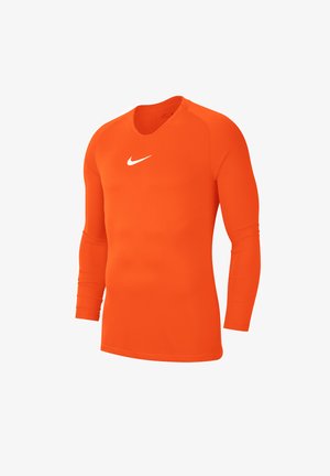 Long-sleeve athletic shirt in bright orange, made of stretch fabric with a round neckline and white Nike swoosh logo centered on the chest.