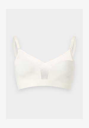 Valge traadita rinnahoidja reguleeritavate rihmade ja võrkvõrgu kujulise V-kujulise detailiga ees keskel, esitatud ühevärvilisel taustal.