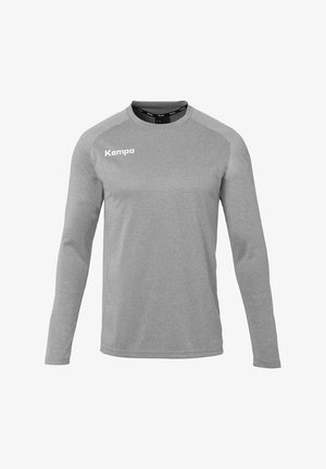 Langærmet grå sportstrøje lavet af åndbart stof, med rund krave og "Kempa" logoet i hvidt på venstre bryst.