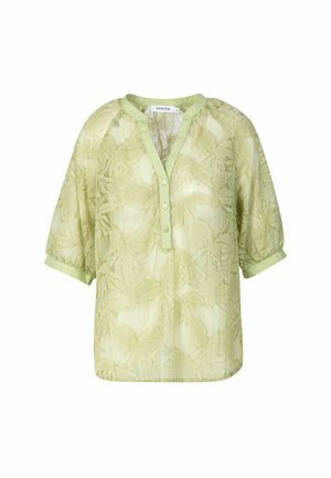Light green blouse made of sheer fabric, featuring a floral pattern, short puff sleeves, a v-neckline, and button closure at the front.