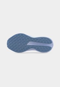 Σόλα παπουτσιού με υφή, από ελαφρύ γαλάζιο καουτσούκ με κυκλικά αντιολισθητικά σημεία και καμπυλωτό σχέδιο για ευελιξία. Καθαρή και μινιμαλιστική δομή.