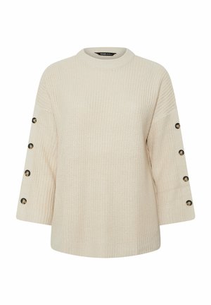 Maglione di colore crema in maglia con colletto rotondo, maniche a tre quarti e dettagli con bottoni lungo gli orli delle maniche. Tessuto testurizzato.