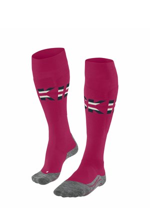 Roze kniekousen met grijze textuurzolen, voorzien van zwart-witte grafische accenten op het bovenste gedeelte. Gemaakt van een soepele, rekbare stof.