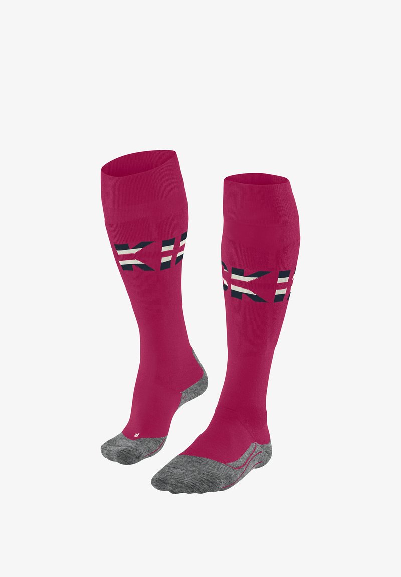 Calze rosa a ginocchio alto con suole grigie textured, dotate di accenti grafici in bianco e nero sulla parte superiore. Realizzate in un materiale liscio e elasticizzato.