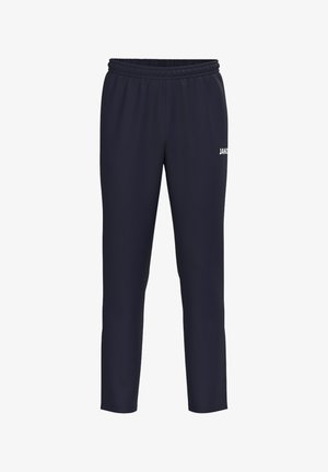 Pantalones deportivos azul marino con cintura elástica y logo blanco de JAKO en la parte superior del muslo derecho.