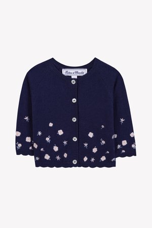 Navy knitted cardigan with round neckline, short sleeves, six silver buttons, and embroidered floral pattern in pink and light blue at the hem.