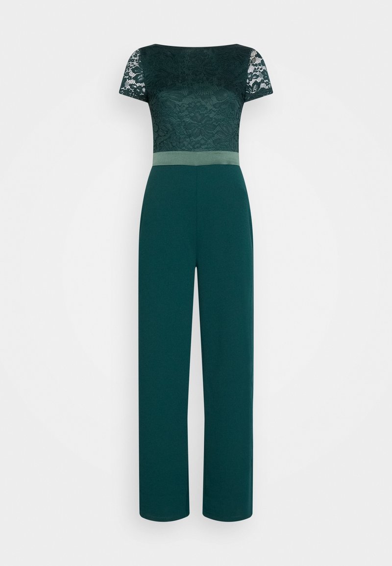 Combinaison vert foncé avec manches courtes en dentelle et corsage supérieur, jambes larges unies, et une ceinture assortie.