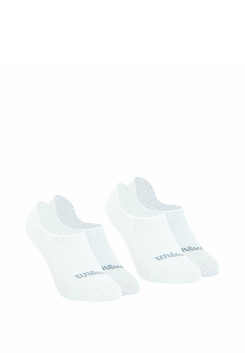 Chaussettes blanches à la cheville avec un design sans couture, présentant un discret logo "Wilson" gris sur le côté et un dessus texturé pour la respirabilité.
