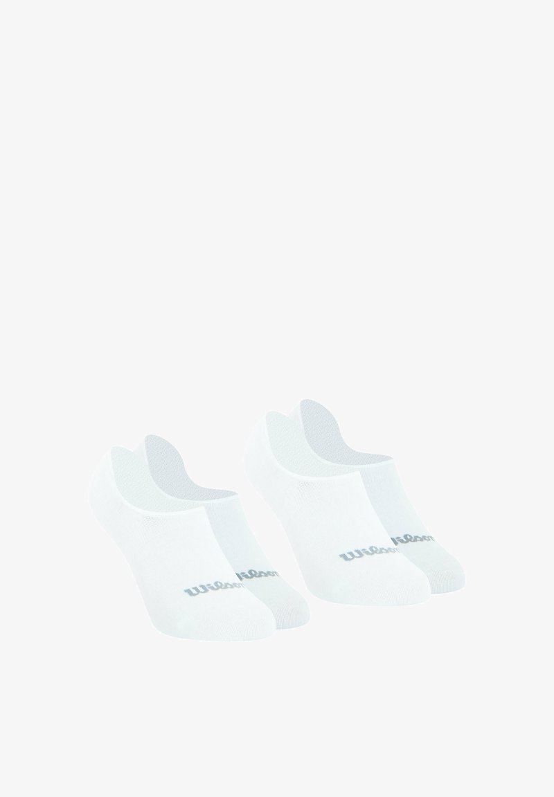 Chaussettes blanches à la cheville avec un design sans couture, présentant un discret logo "Wilson" gris sur le côté et un dessus texturé pour la respirabilité.