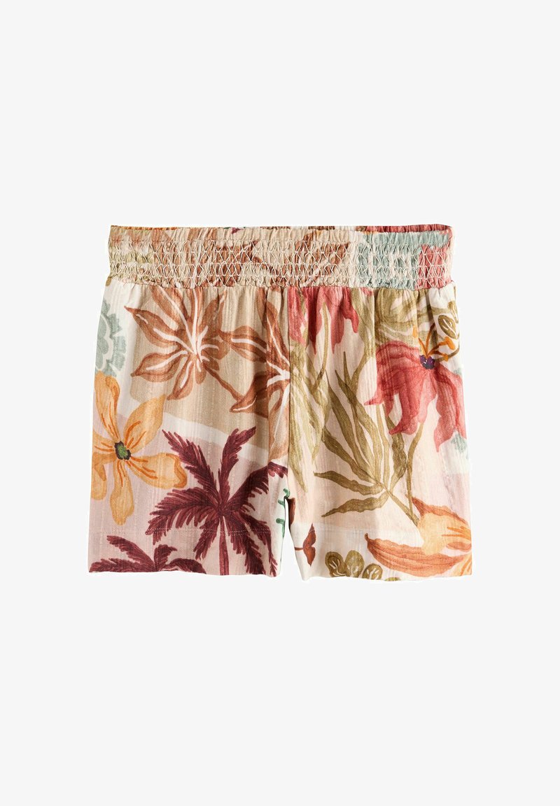 Shorts à taille élastique avec un imprimé floral tropical coloré dans des tons d'orange, rouge, vert et beige sur un fond clair.