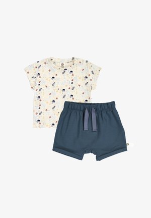 Crèmekleurig peutershirt met korte mouwen en oceaandierenprint en marineblauwe shorts met elastische taille en trekkoord.