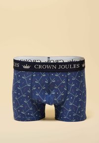 Navy boxer briefs with a pattern of golf clubs and flags, featuring a black elastic waistband with "CROWN JOULES" logo in white.