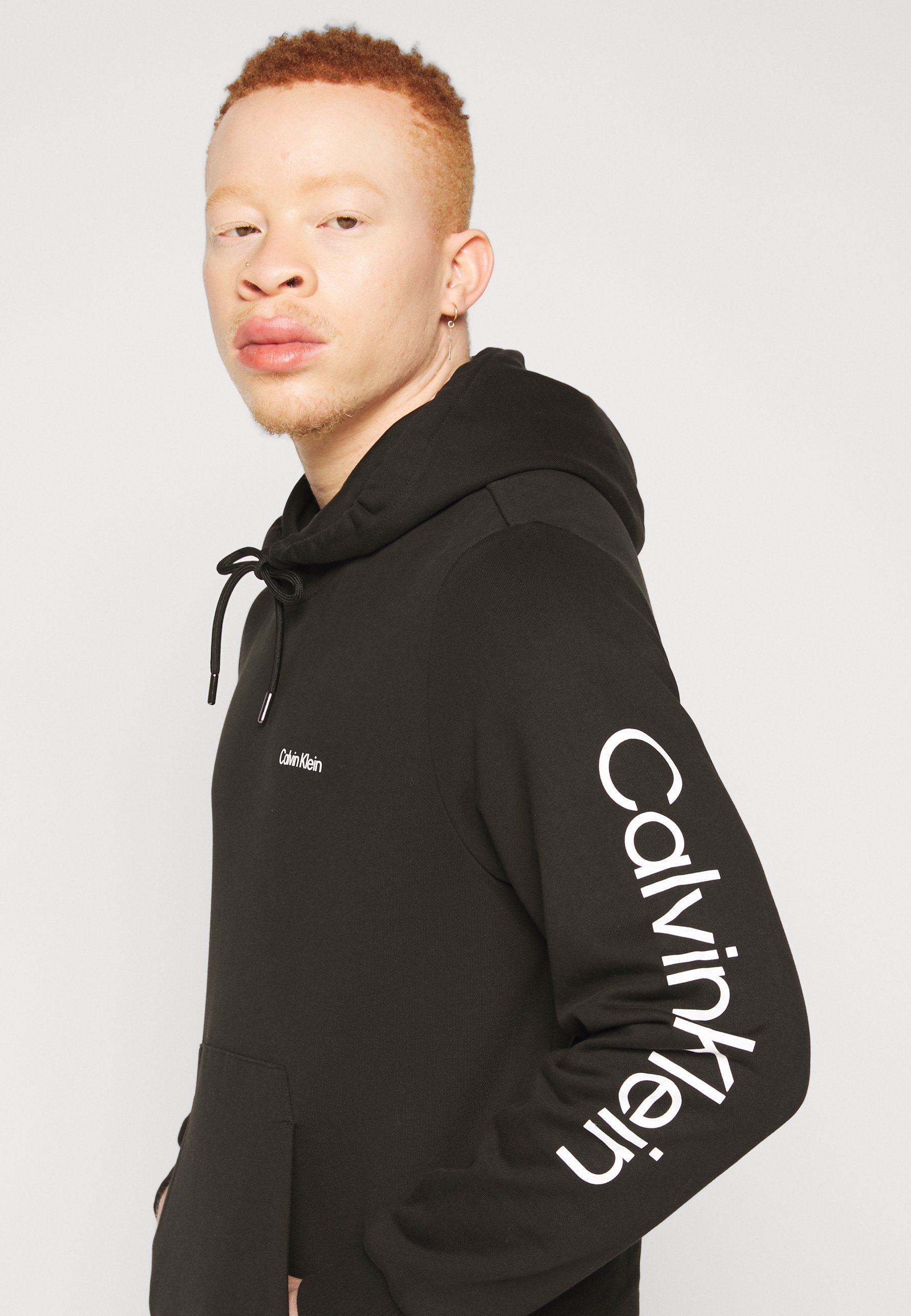 hoodies with words on sleeves