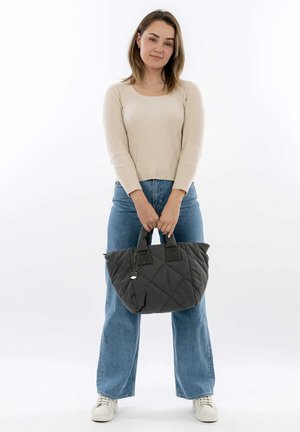 Quilted grey tote bag with two short handles and a rectangular patch. The fabric appears soft with a textured finish.