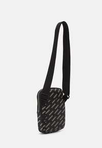 Lacoste SEASONAL UNISEX - Borsa a tracolla - noir farine