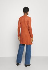 Vero Moda Chaqueta de punto - metallic red