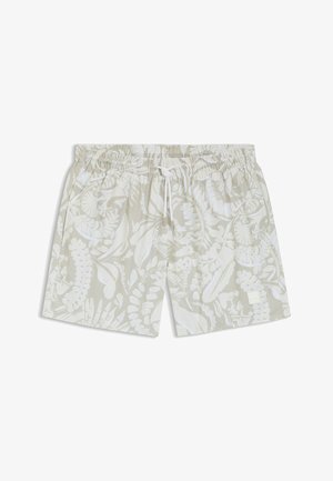 Hellbeige Badeshorts mit weißen tropischen Blattmustern, elastischem Bund und weißem Kordelzug in der Mitte vorne.