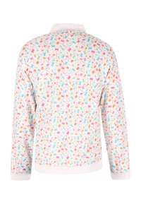 Jachetă cu mâneci lungi, având o bază albă și un model de frunze multicolore. Fabricată dintr-un material neted, dispune de un guler și manșete strâmte.