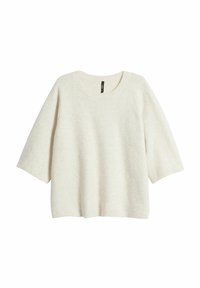 Ljus krämfärgad tröja i mjukt knitmaterial, med rundad halsringning och vida korta ärmar. Minimalistisk design utan mönster eller utsmyckningar.