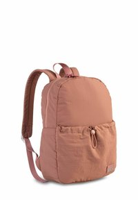 Weicher pinker Rucksack aus leichtem Stoff, mit runder Form, gepolsterten Schulterträgern und einer Fronttasche mit Kordelzugverschluss.