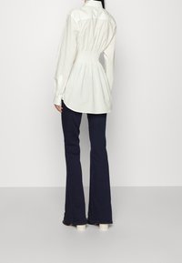 DESIGNERS REMIX Blusa - beige