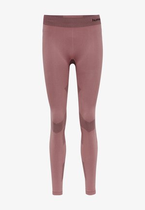 Leggings de sport rose avec un design ajusté, une taille texturée et des motifs géométriques subtils sur les côtés. Tissu extensible pour le confort.