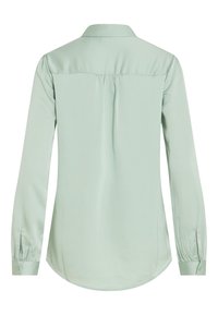 Light green blouse with a collar, long sleeves, and buttoned cuffs. Smooth fabric with a back pleat and rounded hem.