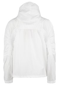 White hooded jacket with elastic details at sleeves and back. Made from lightweight, textured fabric. Features a gathered waist for a relaxed fit.