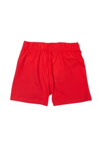 Red cotton shorts with an elastic waistband, flat lay on a white background, no visible patterns or logos.