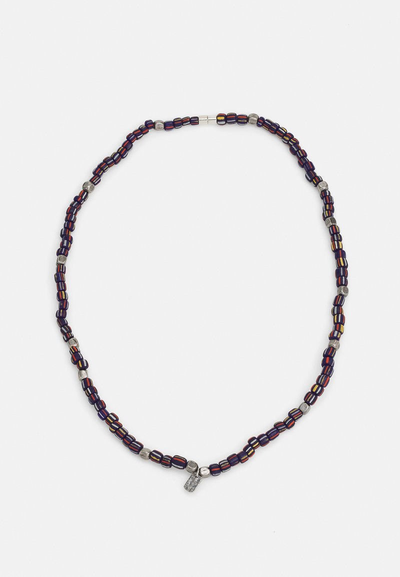 Multicolored beaded necklace with dark blue, red, and yellow beads, interspersed with silver accents and a dangling charm.
