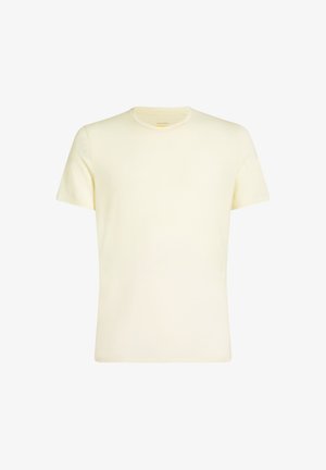 T-shirt di cotone giallo chiaro con collo a giro, maniche corte e una texture liscia. Design semplice, senza fantasie o dettagli aggiuntivi.