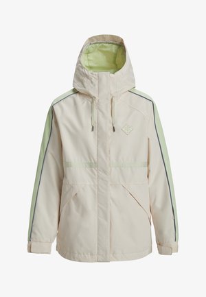 Lys beige jakke med en grøn hætte og ærmer. Har en frontlynlås, to sidelommer og refleksdetaljer langs sømmene.