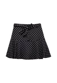 Gonna nera a campana con pois bianchi, caratterizzata da una vita legata e un tessuto texture per un tocco di dettaglio in più.