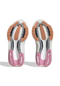 Sneakers med en vit, strukturerad ovandel och gummisålar i rosa och orange. Funktioner inkluderar kontinentala accenter och flexgropar för bättre grepp.