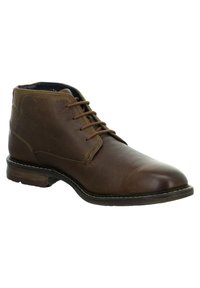 Botas de cuero marrón hasta el tobillo con punta redonda, diseño de cordones y un sutil detalle de costura. Suela de goma con una leve elevación del tacón.
