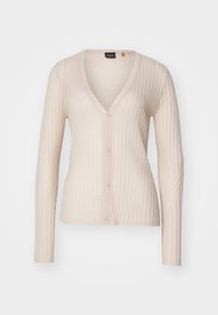 Cardigan côtelé beige clair avec col en V et manches longues, doté d'une fermeture à boutons et d'une texture douce. Ourlet droit.