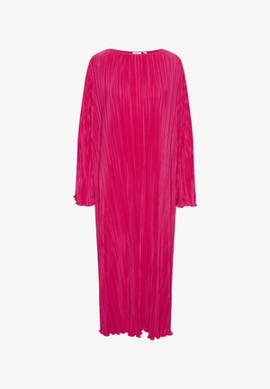Long, loose-fitting, bright pink dress with vertical pleats, round neckline, and long sleeves; features frayed cuffs and hem edges.