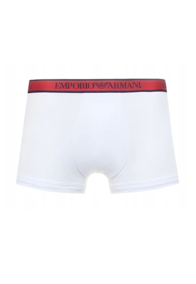 White boxer briefs featuring a red waistband with "EMPORIO ARMANI" logo. Smooth texture, mid-length design, and stitched hem details.
