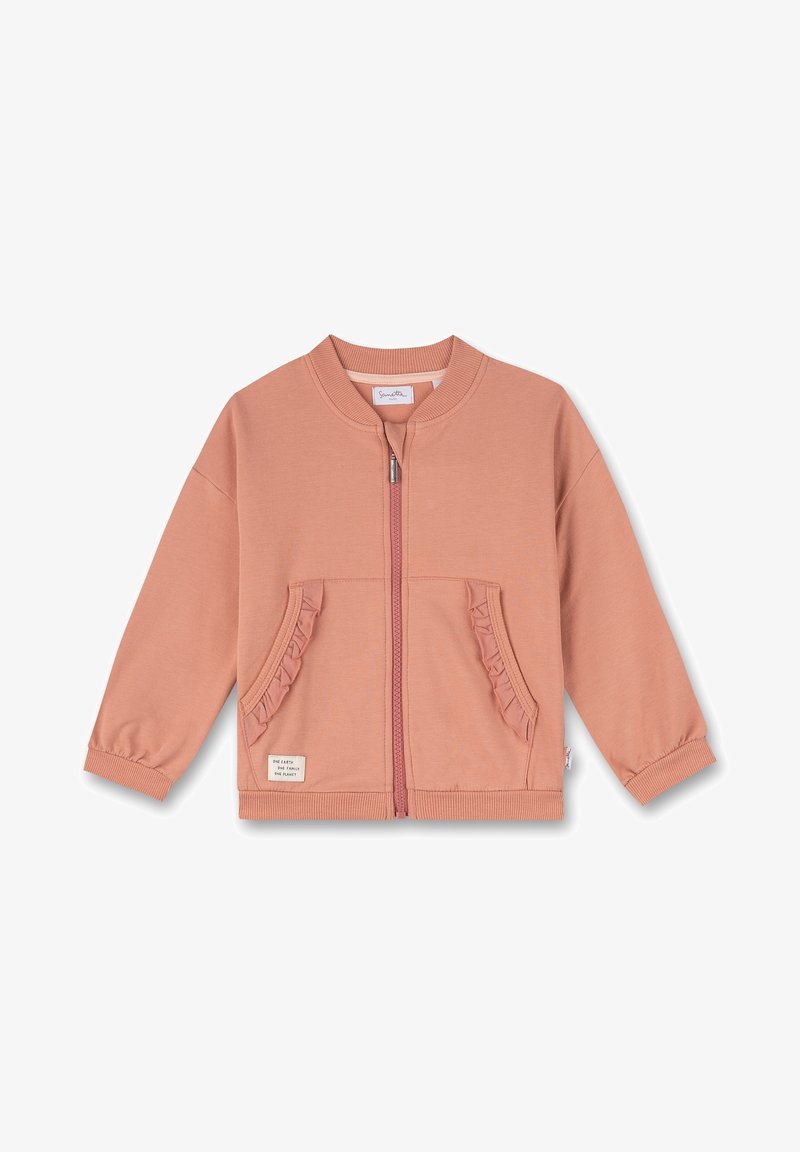 Veste pour enfants couleur rose poussiéreux avec fermeture éclair, poches avant à volants et poignets et ourlet côtelés.
