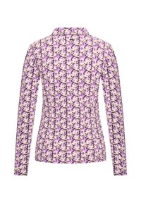 Camisa de manga larga con un patrón floral en tonos púrpura, crema y marrón. Diseño con cuello y silueta ajustada. Tejido elástico.